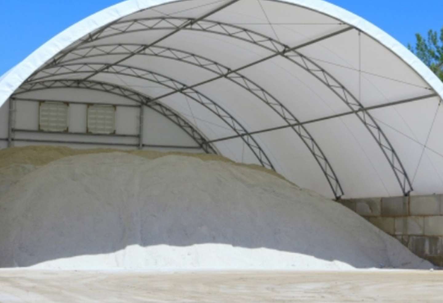 Large pile of winter road salt underneath an awning at the Mar-Co warehouse